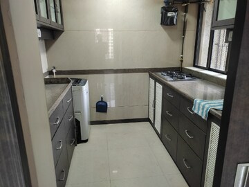 Kitchen in 2 BHK Apartment at Runwal Garden City, Balkum Pada – for Rent