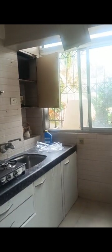 Kitchen in 1 BHK Apartment at Hilton Tower, Andheri East – for Rent