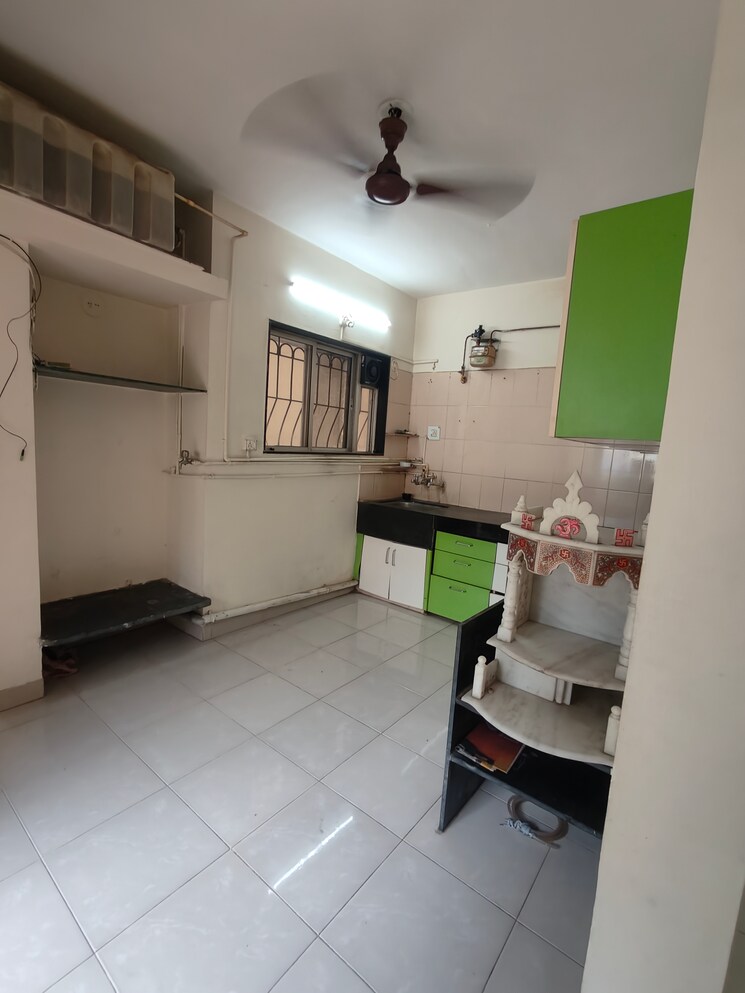 Kitchen, raviraj-planet-millenium 2 Bedroom 900 Sq.Ft. Apartment In Pimple Saudagar Pune 8989192