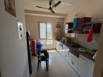 Kitchen in 2 BHK Apartment at Puranik Rumah Bali, Ghodbunder Road – for Rent