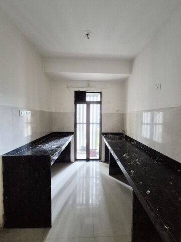 Building Lobby in 1 BHK Apartment at Runwal My City Phase II Cluster 05, Dombivli East – for Rent