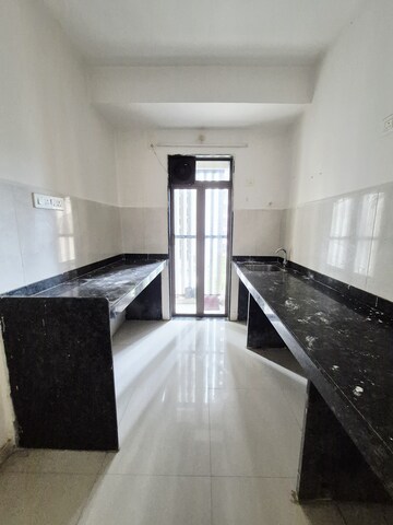 Kitchen in 1 BHK Apartment at Runwal My City Phase II Cluster 05, Dombivli East – for Rent