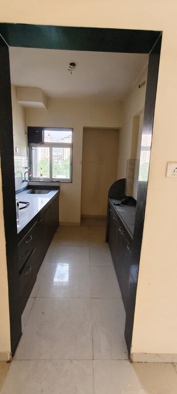 Kitchen in 1 BHK Apartment at Jvm Florencia, Ghodbunder Road – for Rent