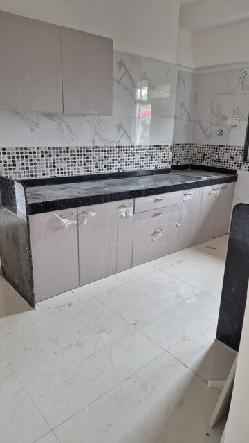 Kitchen in 2 BHK Apartment at Madhuban Shiv Dham Complex, Malad East – for Rent