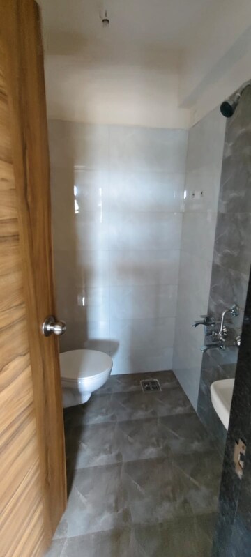 Bathroom in 1 BHK Apartment at KM Horizon Exotica, Haware City – for Rent