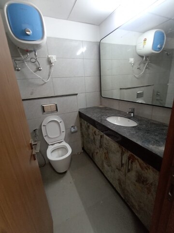 Bathroom in 3 BHK Apartment at Godrej Woods, Sector 43 – for Rent