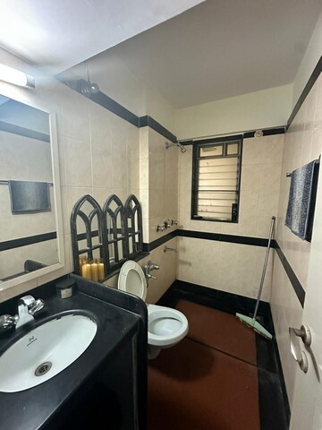 Bathroom in 2 BHK Apartment at Manavsthal Heights, Andheri East – for Sale