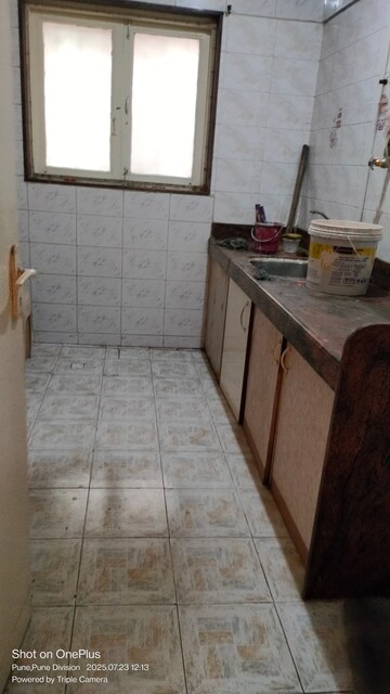 Kitchen in 2 BHK Apartment at Pratik Nagar CHS, Yerawada – for Rent