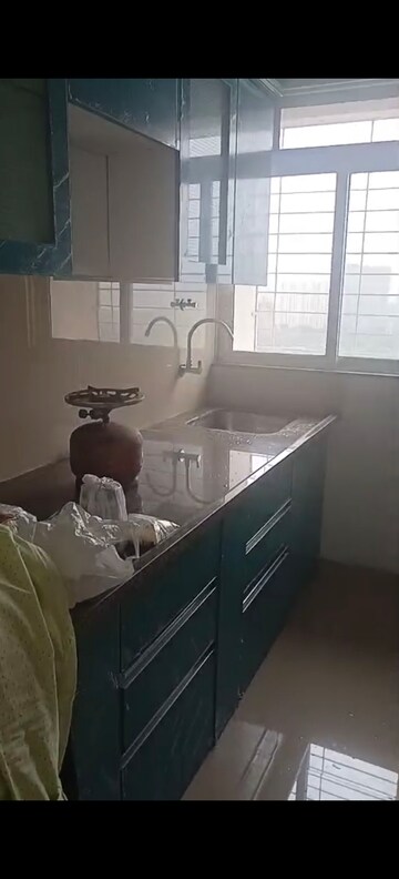 Kitchen in 1 BHK Apartment at Puranik City, Kasarvadavali – for Rent