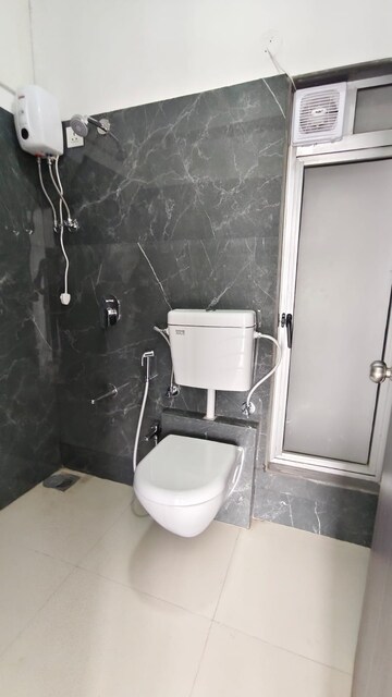 Bathroom in 1 BHK Apartment at Mansarovar Pearl Gardens, Vasai West – for Rent