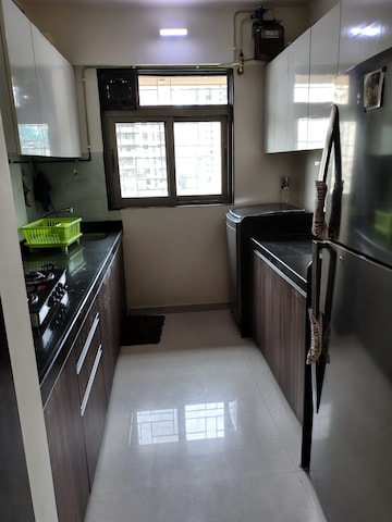 Kitchen in 2 BHK Apartment at Lashkaria Anurag CHS, Andheri West – for Rent