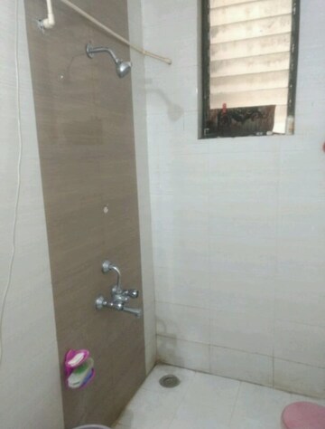 Bathroom in 1 BHK Apartment at Kamdhenu Jasmine CHS, Pimple Saudagar – for Rent