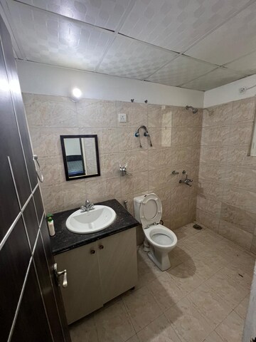 Bathroom in 3 BHK Apartment at Orris Aster Court, Sector 85 – for Rent