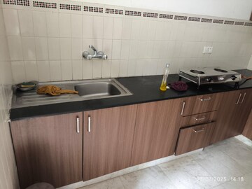 Kitchen in 3 BHK Apartment at SJR WaterMark, Harlur – for Rent