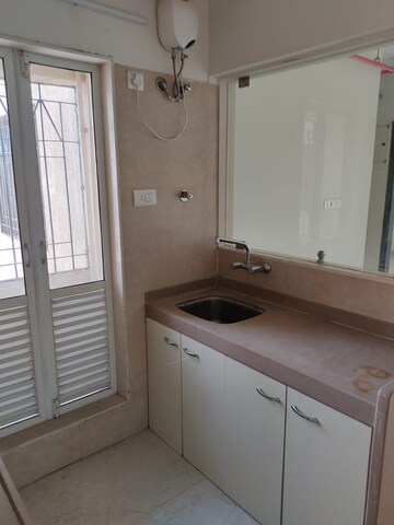 Kitchen in 1.5 BHK Apartment at Dosti West County, Balkum Pada – for Sale