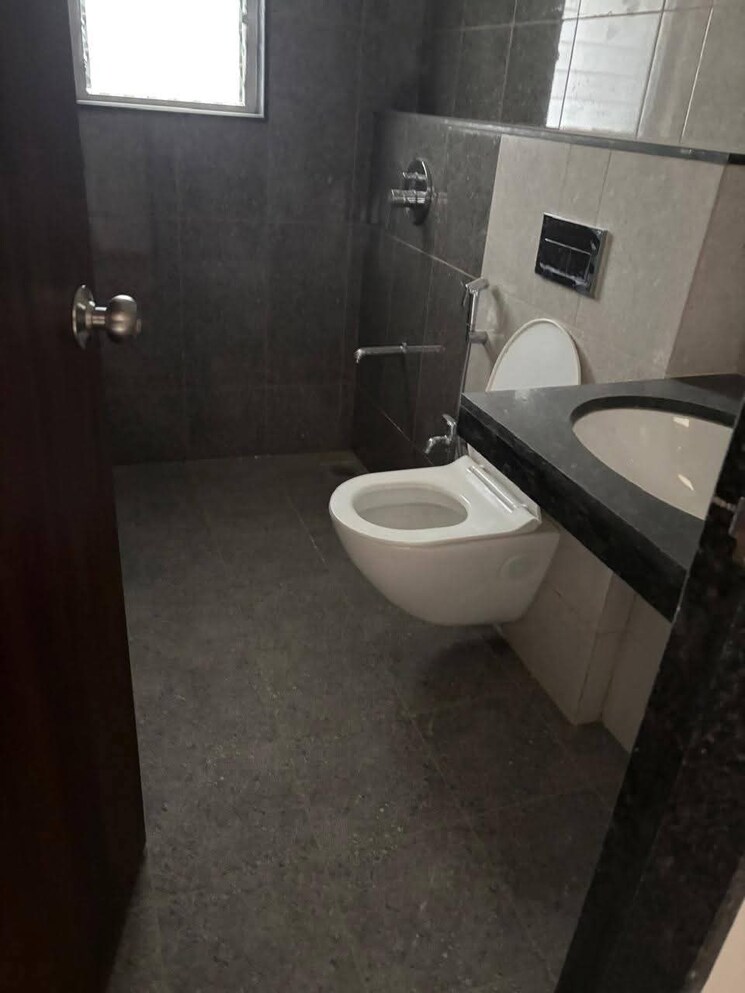 Bathroom, geras-world-of-joy-s 2 Bedroom 1000 Sq.Ft. Apartment In Kharadi Pune 8990812