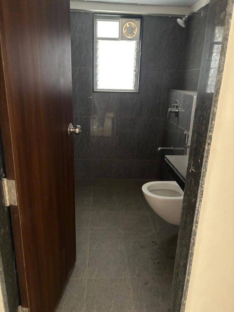 Bathroom, geras-world-of-joy-s 2 Bedroom 1000 Sq.Ft. Apartment In Kharadi Pune 8990812
