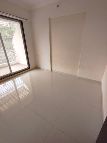 Room in 2 BHK Apartment at Om Shree Sai Woodside Meadows, Kalyan West – for Rent