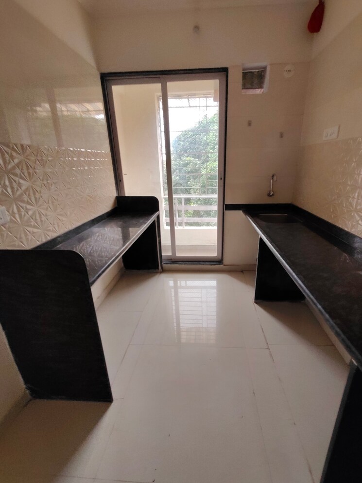 Kitchen, om-shree-sai-woodside-meadows 2 Bedroom 652 Sq.Ft. Apartment In Kalyan West Thane 8990941
