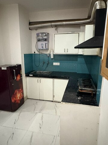 Kitchen in 1.5 BHK Builder Floor at Palam Vihar Extension – for Rent