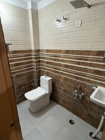 Bathroom in 1.5 BHK Builder Floor at Palam Vihar Extension – for Rent