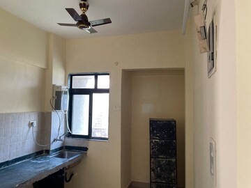 Kitchen in Studio Apartment at Haware Citi, Ghodbunder Road – for Sale