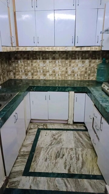 Kitchen in 2 BHK Builder Floor at Sharma Apartments Burari, Burari – for Rent