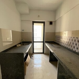 Kitchen in 1 BHK Apartment at Lodha Palava City Lakeshore Greens, Hedutane – for Sale