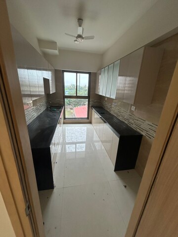 Kitchen in 2 BHK Apartment at Rajesh Raj Infinia, Malad West – for Rent