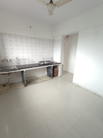 Kitchen in 2 BHK Apartment at Wadgaon Sheri – for Rent