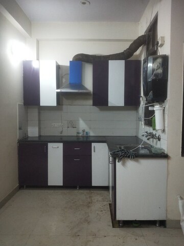 Kitchen in 2 BHK Apartment at Krishna Vatika Society, Sector 4 Greater Noida – for Sale