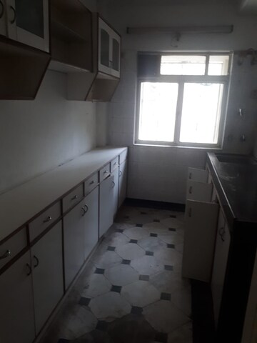 Kitchen in 2 BHK Apartment at Palace Orchard CHS, Mohammadwadi – for Sale
