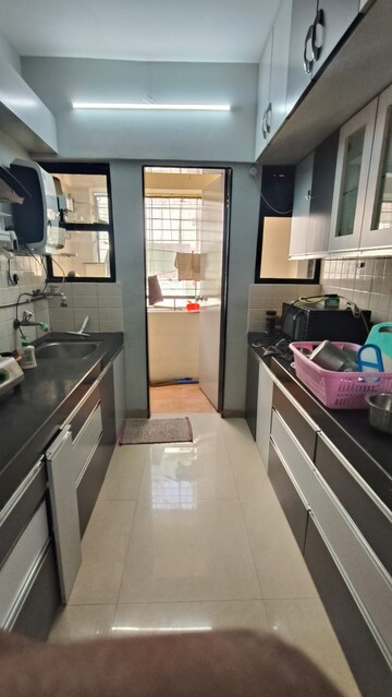 Kitchen in 2 BHK Apartment at Nagpal Dev Exotica, Kharadi – for Rent