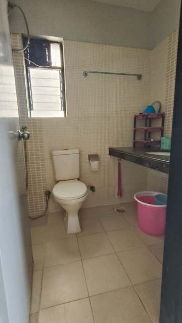 Bathroom in 2 BHK Apartment at Kolte Patil Cilantro, Wagholi – for Rent