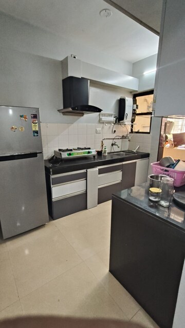 Kitchen in 2 BHK Apartment at Kolte Patil Cilantro, Wagholi – for Rent