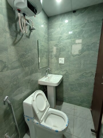Bathroom in 1 BHK Builder Floor at Ansal Palam Triangle, Palam Vihar Extension – for Rent