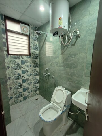 Bathroom in 1 BHK Builder Floor at Ansal Palam Triangle, Palam Vihar Extension – for Rent