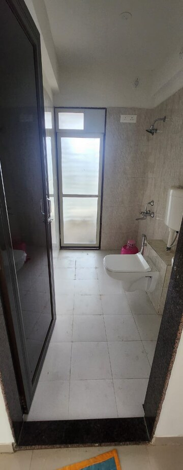Bathroom in 4 BHK Apartment at Lodha Luxuria, Majiwada – for Rent