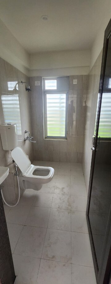 Bathroom in 4 BHK Apartment at Kalpataru Immensa, Kolshet Road – for Rent