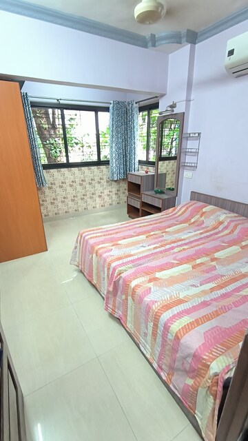 Bedroom in 2 BHK Apartment at Miramar CHS, Dadar West – for Rent