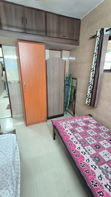 Bedroom in 2 BHK Apartment at Miramar CHS, Dadar West – for Rent