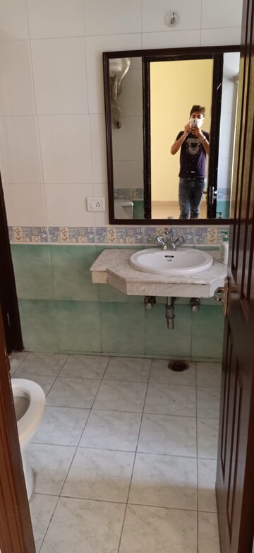 Bathroom in 3 BHK Apartment at Sandwoods Spangle Heights, Dhakoli – for Sale