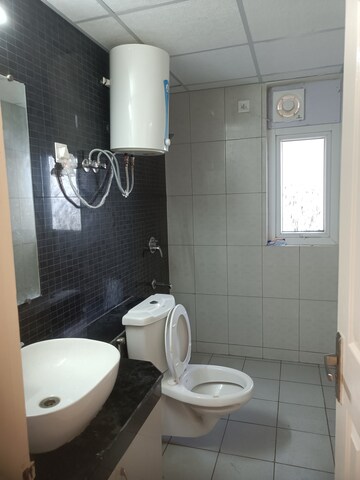 Bathroom in 3 BHK Apartment at Lotus Panache, Sector 110 – for Rent