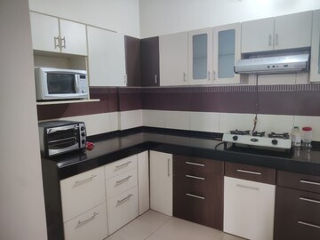 Kitchen in 2 BHK Apartment at Kolte Patil Green Groves, Wagholi – for Rent