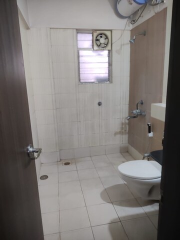 Bathroom in 2 BHK Apartment at Kolte Patil Green Groves, Wagholi – for Rent