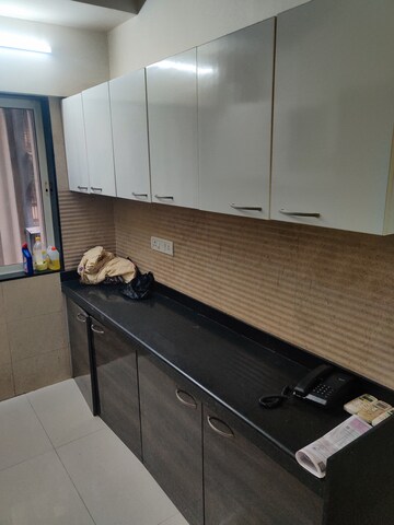 Furnished Amenities in 2 BHK Apartment at Romell Diva, Malad West – for Rent