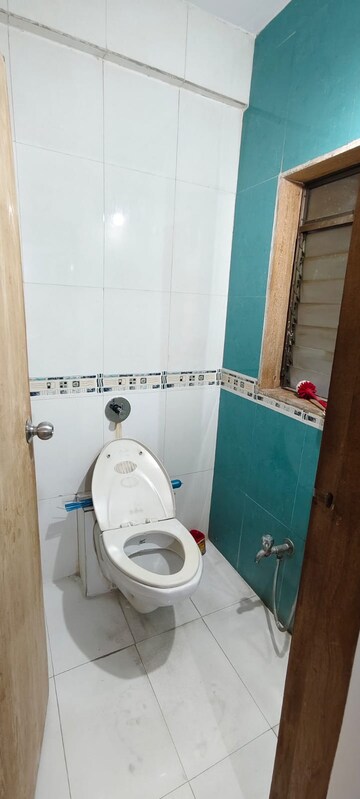 Bathroom in 2 BHK Apartment at Raunak Unnathi Woods Phase 4 And 5, Ghodbunder Road – for Rent