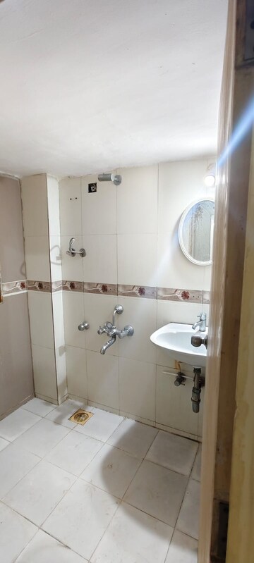 Bathroom in 2 BHK Apartment at Raunak Unnathi Woods Phase 4 And 5, Ghodbunder Road – for Rent