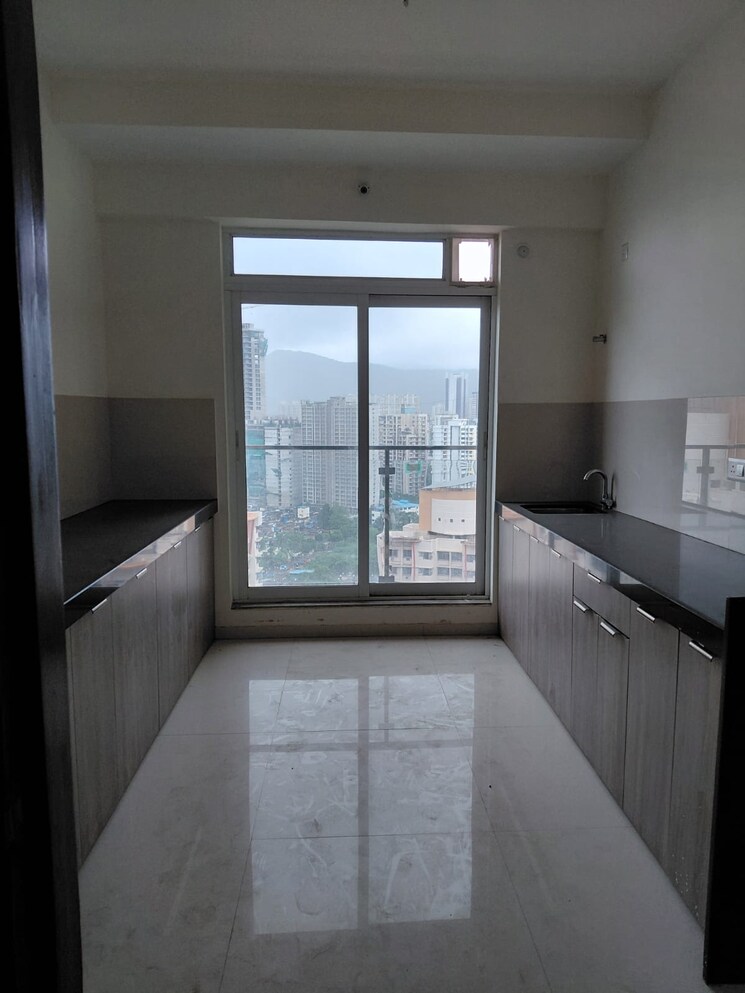 Kitchen, dosti-imperia-elecia-chsl 4 Bedroom 750 Sq.Ft. Apartment In Ghodbunder Road Thane 8992119