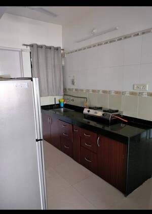 Kitchen in 2 BHK Apartment at Magarpatta City Iris, Hadapsar – for Sale